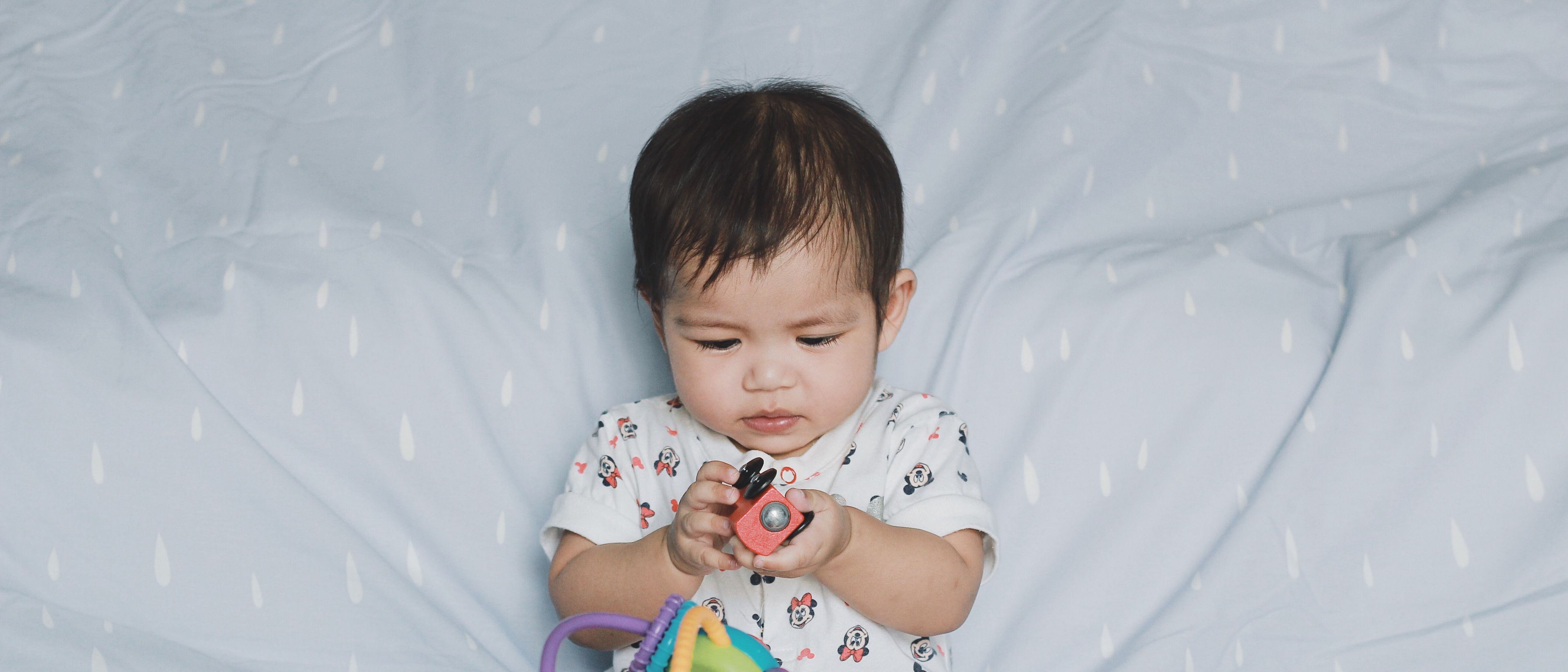 Toddler playing with her toys.